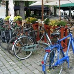 Bruges.BikesAlongCafe